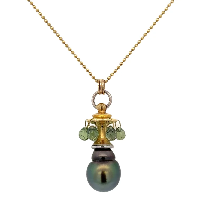 Luxury Jewelry Without The Luxury Price Tag Designer South Sea Tahitian Pearl and Peridot Pendant in 18k Yellow Gold by William Travis Luxury Jewelry Without The Luxury Price Tag Designer South Sea Tahitian Pearl and Peridot Pendant in 18k Yellow Gold by William Travis