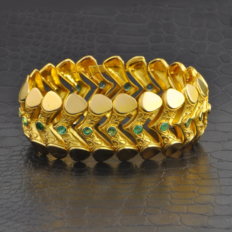 Special Deals On Handcrafted And Designer Jewelry Magnificent Vintage Chevron Style Emerald Bracelet in 18k Yellow Gold Special Deals On Handcrafted And Designer Jewelry Magnificent Vintage Chevron Style Emerald Bracelet in 18k Yellow Gold