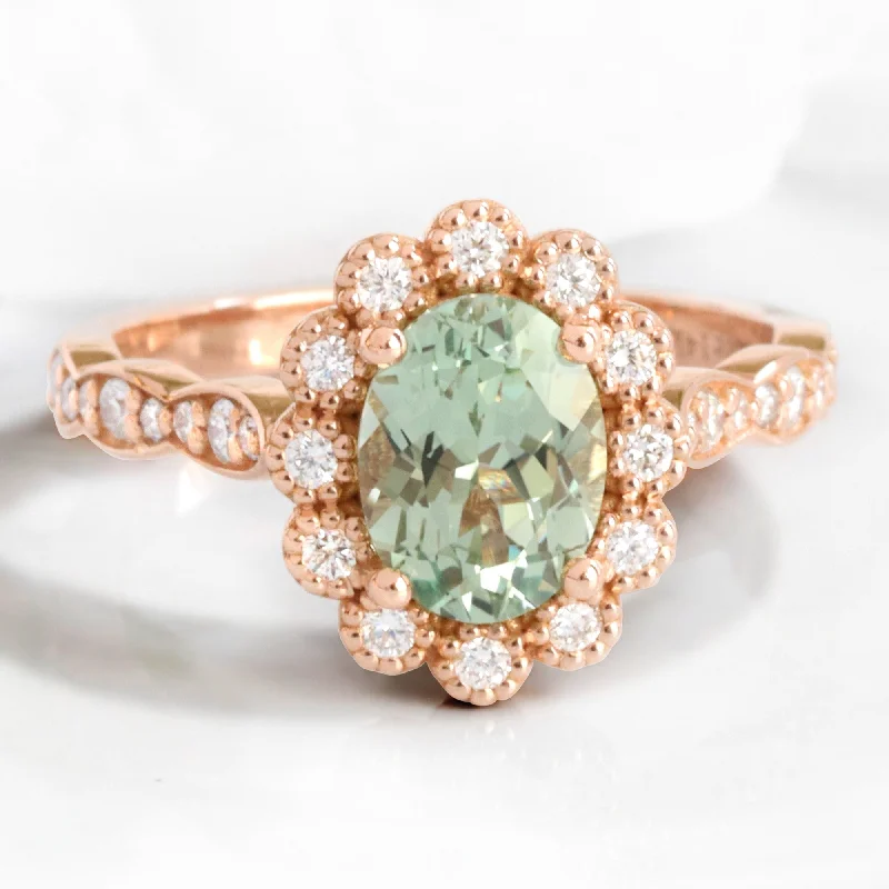 Trending Jewelry Now Available At Exclusive Prices Oval Seafoam Green Sapphire Ring in Vintage Luna Halo Diamond Ring Trending Jewelry Now Available At Exclusive Prices Oval Seafoam Green Sapphire Ring in Vintage Luna Halo Diamond Ring