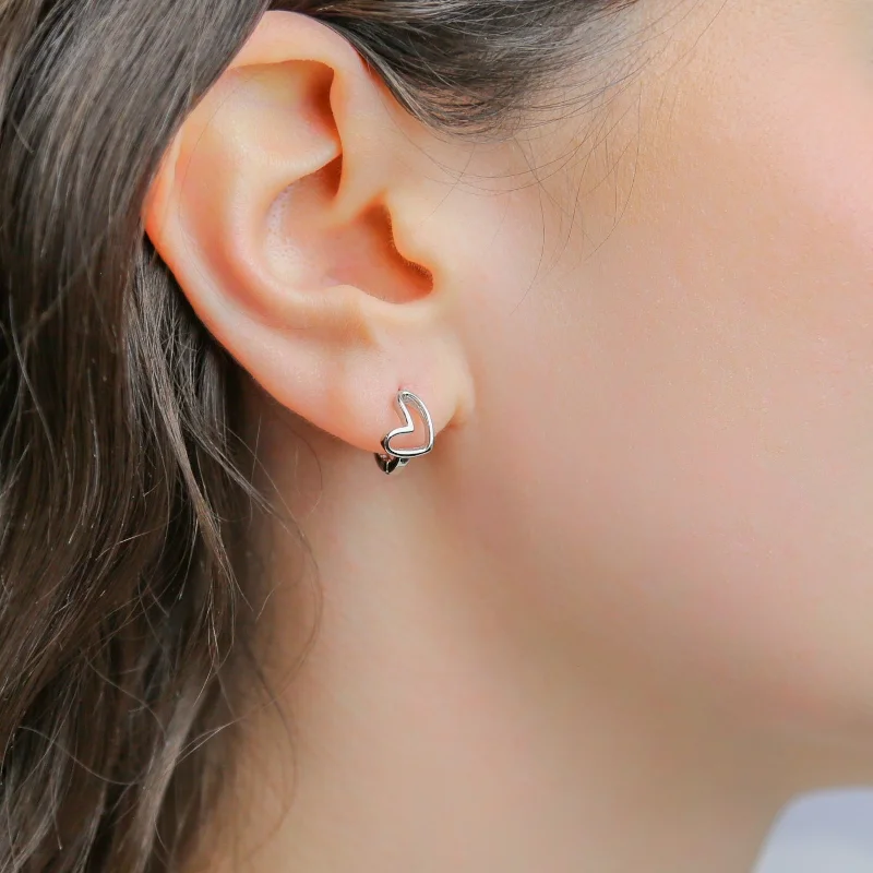 Shop Dazzling Jewelry At The Best Prices SIDEWAYS - Sterling Silver Heart Hoop Earrings Shop Dazzling Jewelry At The Best Prices SIDEWAYS - Sterling Silver Heart Hoop Earrings