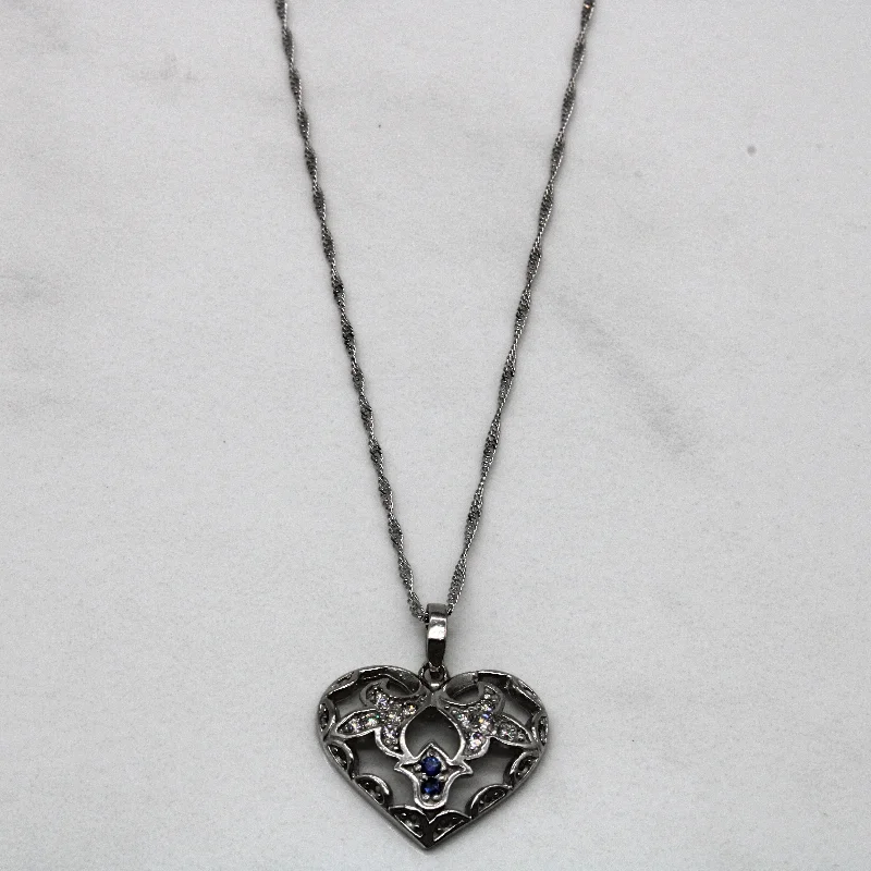Elegant Jewelry, Affordable Luxury – Shop Now Diamond & Sapphire Heart Pendant Necklace | 0.11ctw, 0.05ctw | 18" | Elegant Jewelry, Affordable Luxury – Shop Now Diamond & Sapphire Heart Pendant Necklace | 0.11ctw, 0.05ctw | 18" |